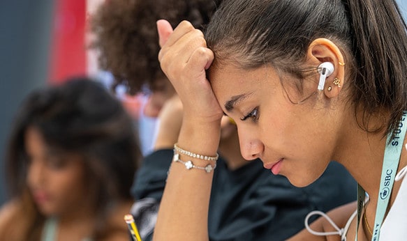 female-studying-using-headphones