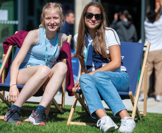 two-students-on-deckchairs
