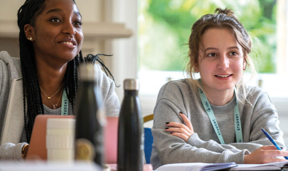 two-female-students-in-english-class