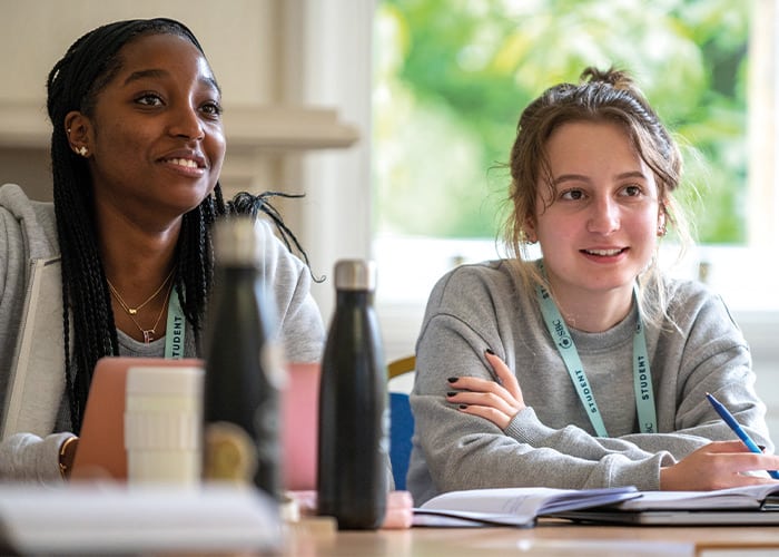 two-female-students-in-english-class