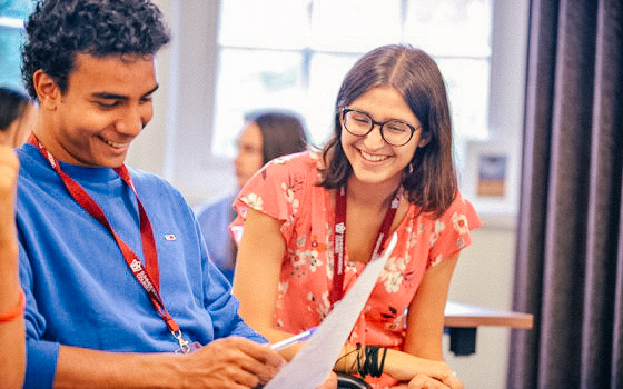 students smiling in an oxford class