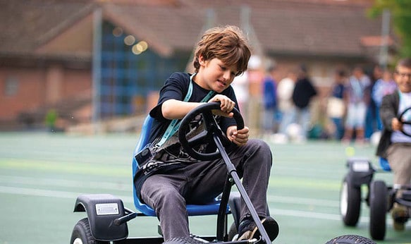 Day-camp-student-using-go-cart-in-summer-school