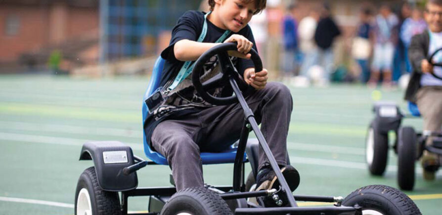Day-camp-student-using-go-cart-in-summer-school