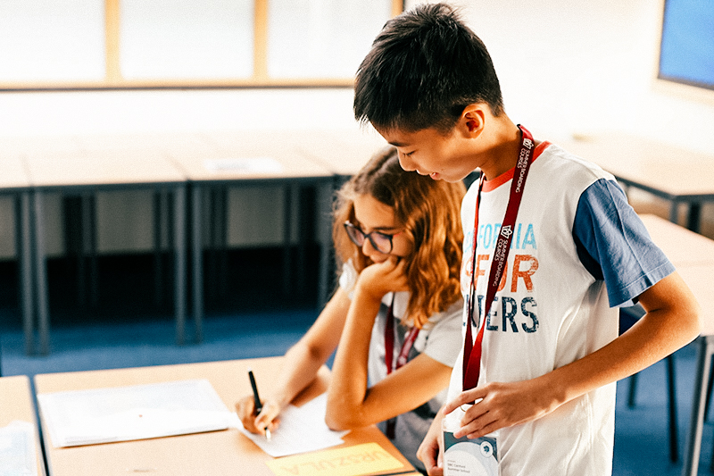 two students discussing work
