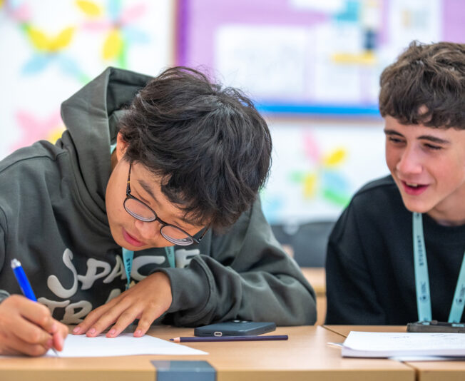 Engaging summer boarding courses for teenagers focused on academic learning and social development in a classroom setting in the UK