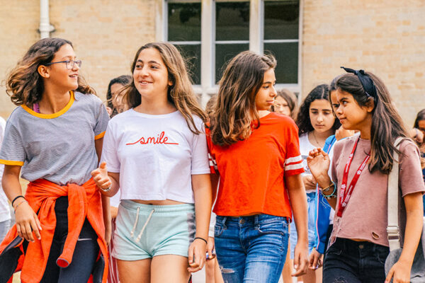 female students walking together at summer school lowres