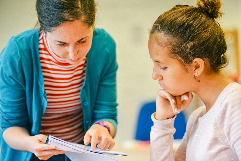 paragraph writing prompts grade 8 learning english teacher and student in class lowres