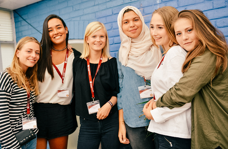 oxford college students all stood together smiling lowres