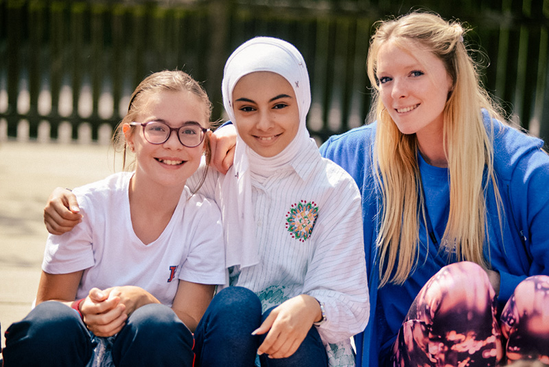 sbc staff member with her arms around students lowres