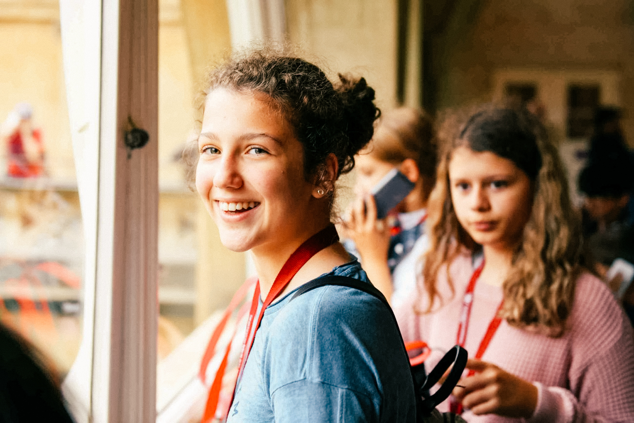 students smiling at their summer school