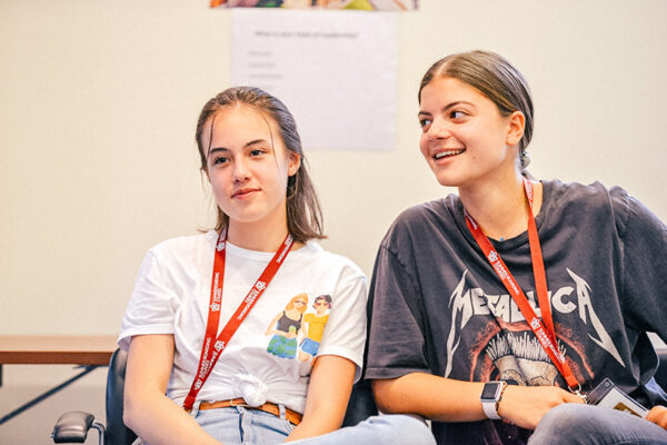 Two female students sat together in class