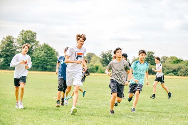 Camp students outside running around