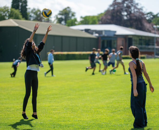 Headington-school-students-playing-ball-on-the-grass