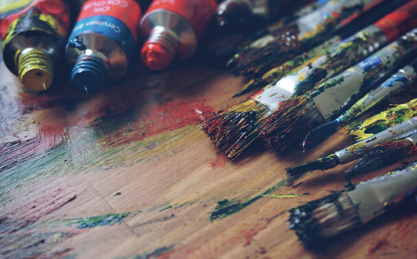 Paint-brushes-covered-in-paint