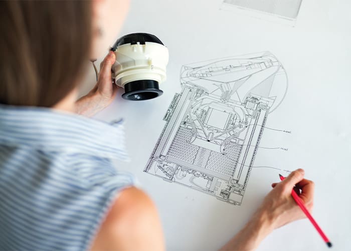 female-drawing-engineering-designs