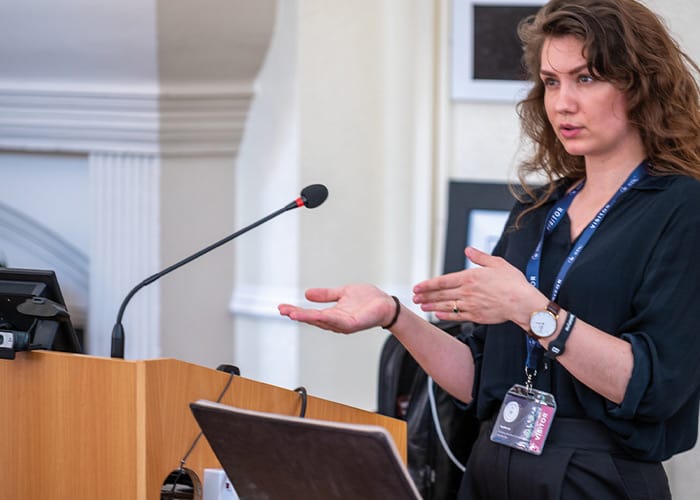 female-speaker-presenting-at-summer-school-uk