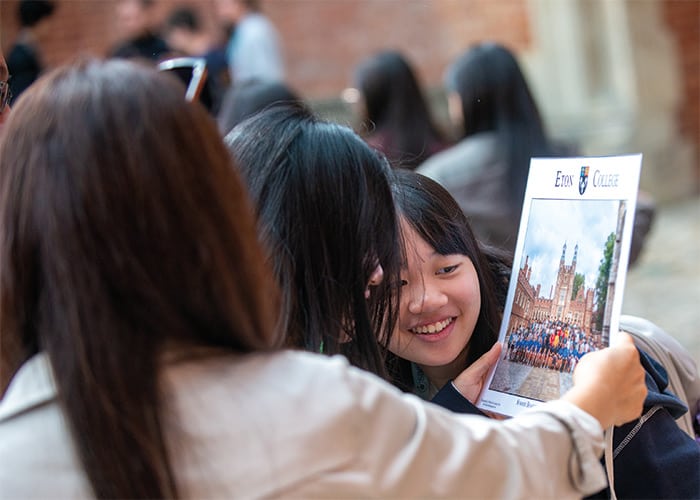 parents-and-student-looking-at-eton-college-map