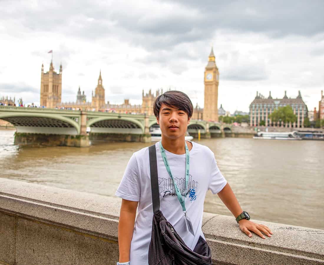 student-posing-in-front-f-London-bridge-UK