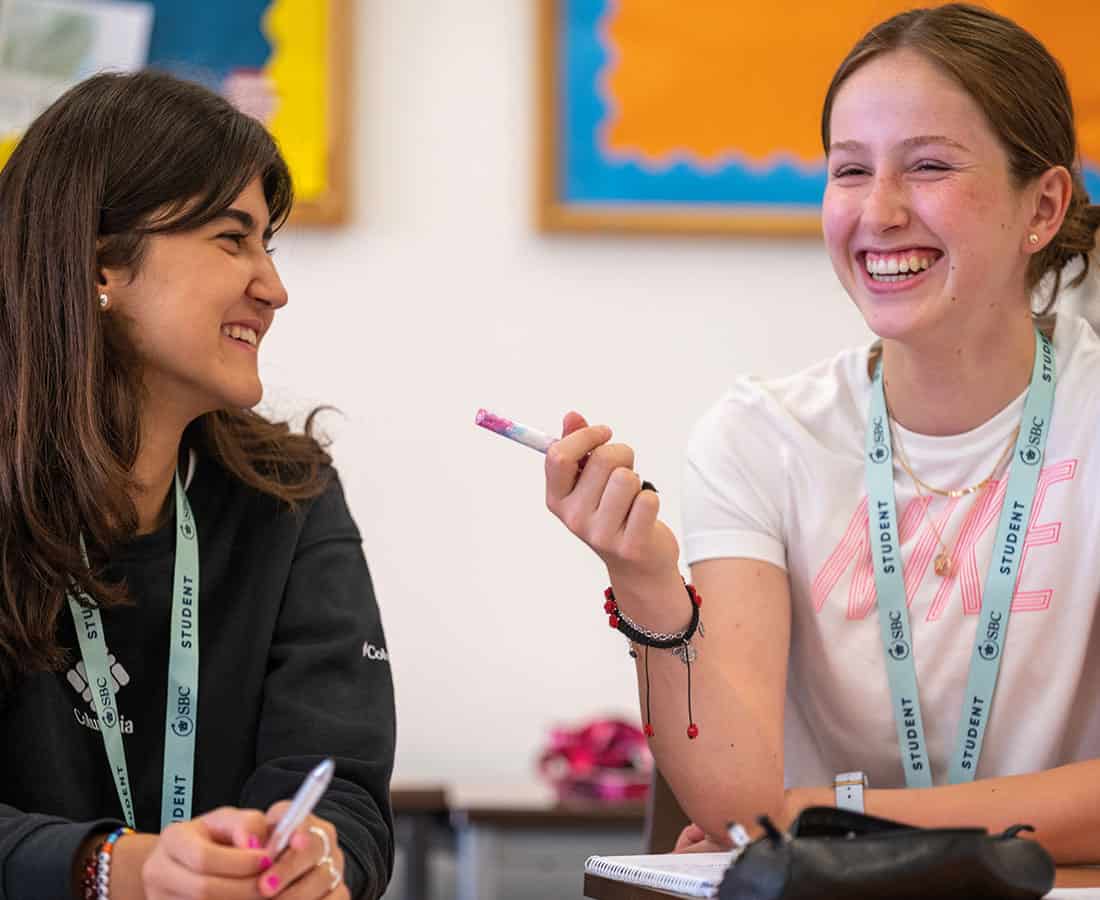 two-female-headington-students-in-class