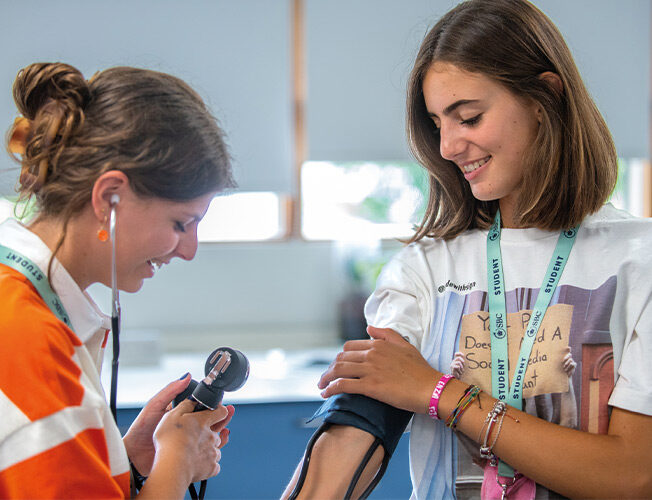 two-medical-students-using-medical-tools