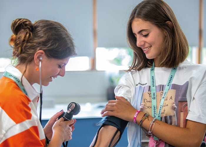 two-medical-students-using-medical-tools