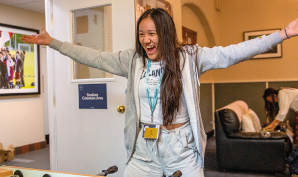 Female-Student-Playing-Foosball-at-SBC-Eton-College-Summer-School