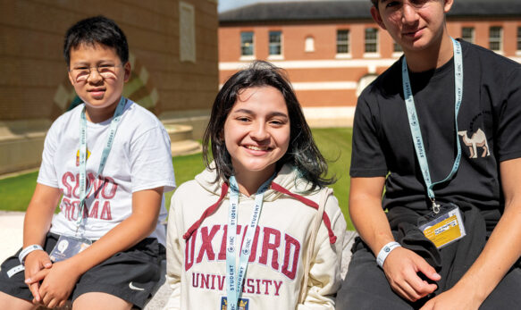 Female-and-two-male-students-outside-on-a-sunny-day-at-SBC-at-Eton-College-Summer-School