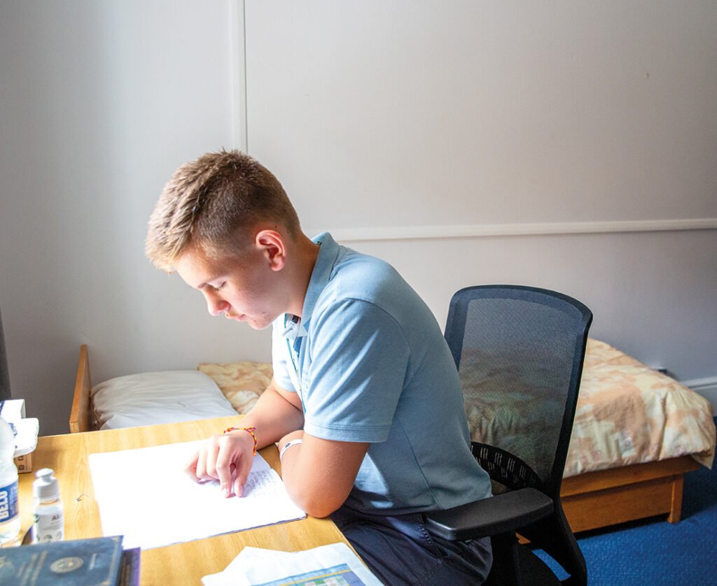 Male-Student-Studying-in-his-room-at-SBC-Eton-College-Summer-School
