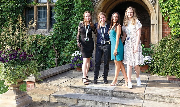 SBC-Cambridge-colege-students-stood-outside-graduation-hall-UK