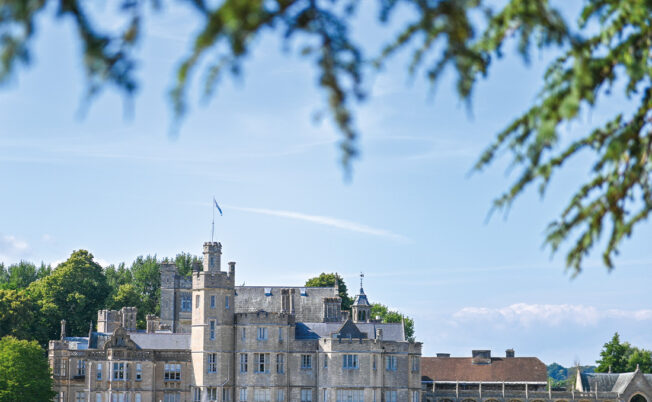 SBC Canford School building with trees surronding it