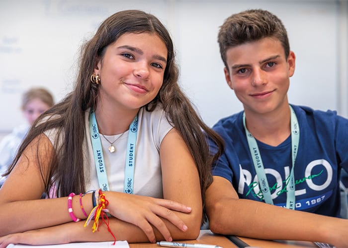 SBC-Canford-international-relations-students-smiling-in-class