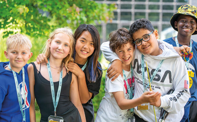 SBC-Canford-students-smiling-arms-around-eachothe