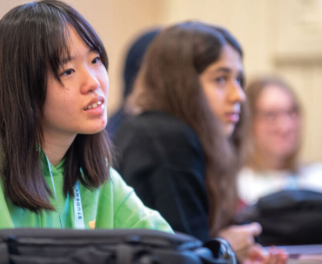 SBC-Headington-summer-school-student-listening-and-smiling-in-english-lesson