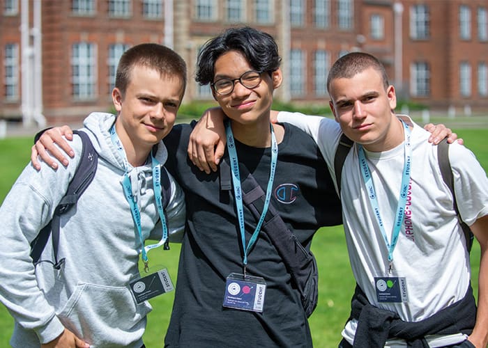 three-friends-stood-outside-Oxford-school