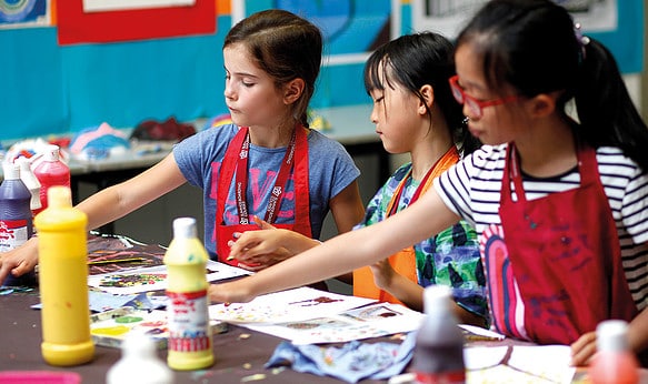 Three Female Student Doing Arts and Crafts at Camp Dragon