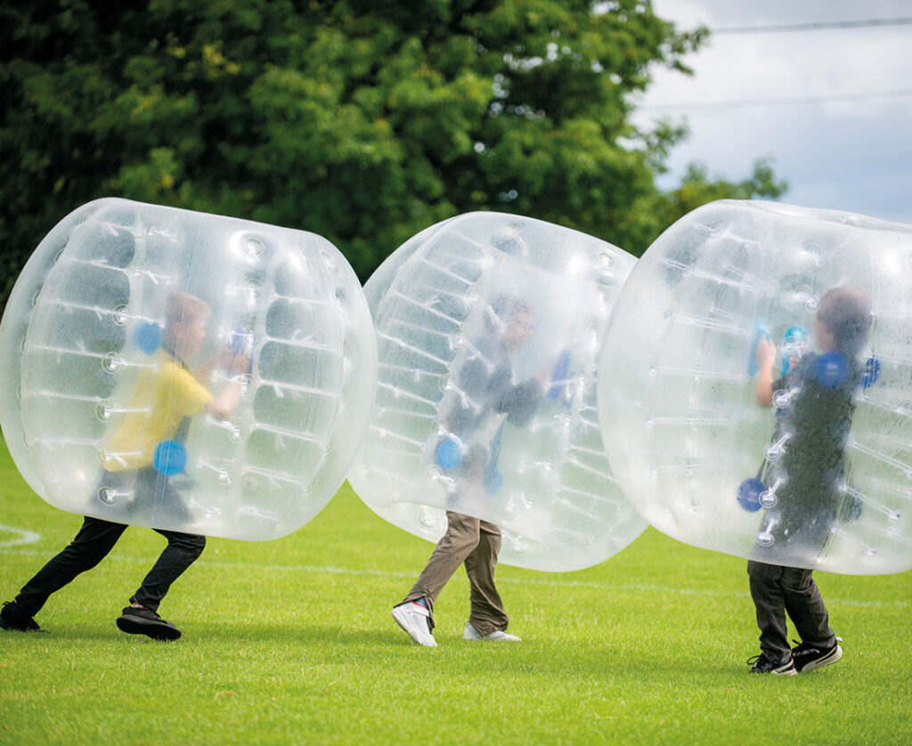Twyford-taking-part-in-an-activity-of-zorbing